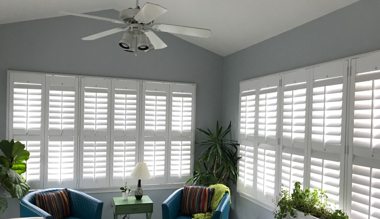 St. George living room with fan and shutters